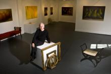 Charles Hewitt with some of his works Charles Hewitt with some of his works